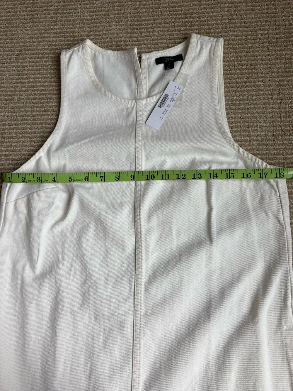 J Crew Denim dress with distressed hem with tags.